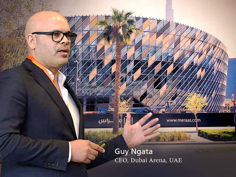 Guy Ngata - CEO with Coca-Cola Arena on the background